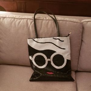 Adorable shoulder purse purchased at a boutique